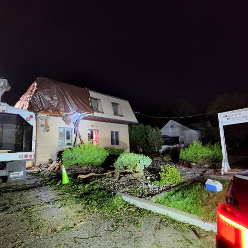 Nighttime emergency tree services being performed by the arborists at Aspen Tree Service Inc. in Clifton, NJ.